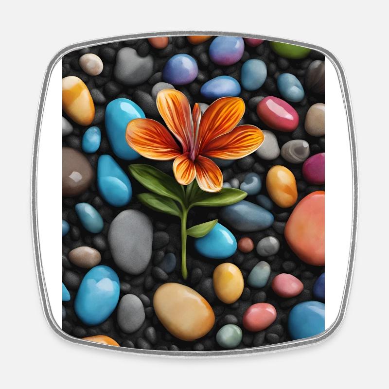Une fleur au milieu de galets de couleurs - Magnet carré - blanc