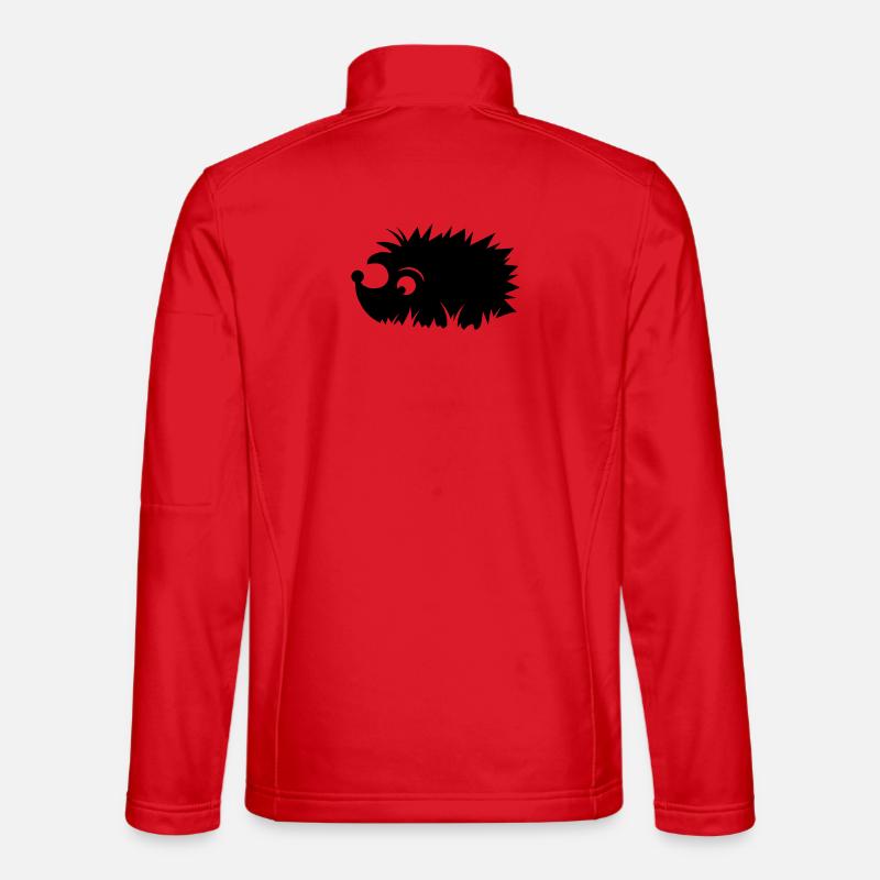 A hedgehog is sitting in a meadow Unisex Softshell Jacket