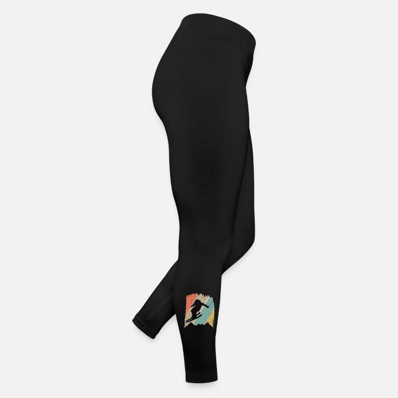 Silhouette de snowboard rétro sur rayures pastel Legging en jersey Femme