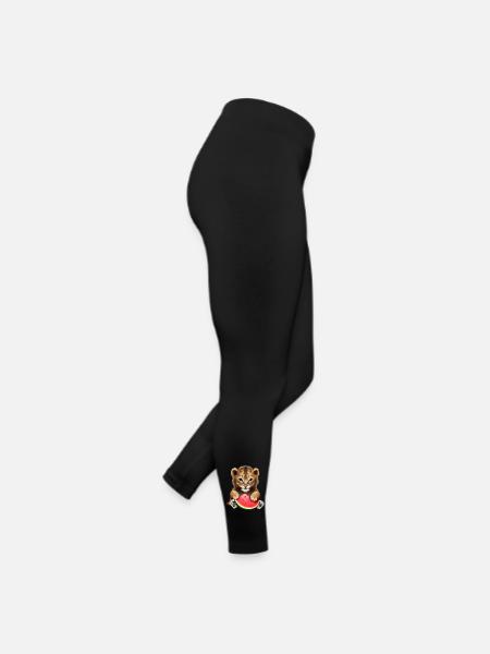 Un bébé lion mange de la pastèque - Legging en jersey Femme - noir - Droite