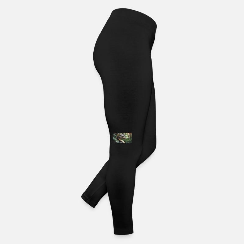 Un dragon vert majestueux et réaliste chasse Legging en jersey Femme