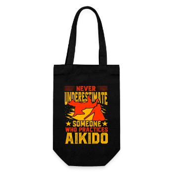 Unterschätzen Sie niemals jemanden, der Aikido praktiziert - Geschenkbeutel für Flaschen - Schwarz - Vorne