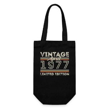 April 1977, Born in april 1977 - 48th birthday - Gift Bag for Bottles - black - Front