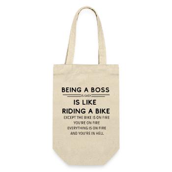 BEING A BO$$ IS LIKE RIDING A BIKE - Gift Bag for Bottles - nature - Front