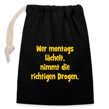 Wer montags lächelt, nimmt die richtigen Drogen. - Verschließbarer Geschenkbeutel aus Baumwolle (14x20cm) - Schwarz - Vorne