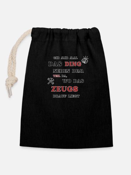 Give me the thing next to that part there,.... - Closable cotton gift bag (14x20cm) - black