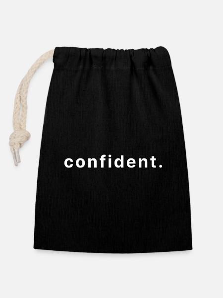 confident. - Verschließbarer Geschenkbeutel aus Baumwolle (14x20cm) - Schwarz