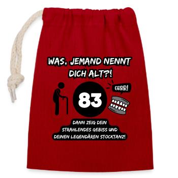 83 and legendary: Bit out, stick dancing on! - Closable cotton gift bag (14x20cm) - red - Front