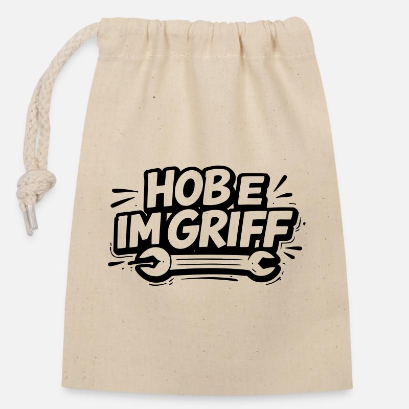 Hobe im Griff - Verschließbarer Geschenkbeutel aus Baumwolle (14x20cm) - Natur