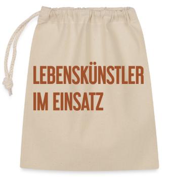 Lebenskünstler im Einsatz - Verschließbarer Geschenkbeutel aus Baumwolle (25x30cm) - Natur - Vorne