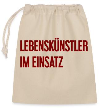 Lebenskünstler im Einsatz - Verschließbarer Geschenkbeutel aus Baumwolle (25x30cm) - Natur - Vorne
