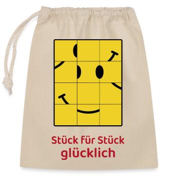 Pièce par pièce joyeuse – Puzzle Smiley - Sac cadeau en coton avec cordon (25 x 30 cm) - nature - Devant