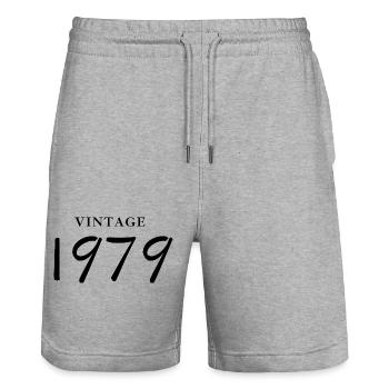 Jahrgang 1979 - Jubiläums-Geschenkidee - Stanley/Stella Unisex Bio Joggingshorts Trainer  - Grau meliert - Vorne - Nik (191cm) & Marisol (170cm)