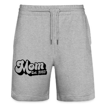 2023, werdende Mutter, Schwangerschaft enthüllen - Stanley/Stella Unisex Bio Joggingshorts Trainer  - Grau meliert - Vorne - Nik (191cm) & Marisol (170cm)