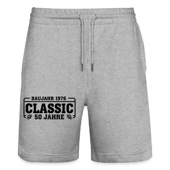 Year of manufacture 1976 Classic – 50th anniversary - Stanley/Stella Trainer Unisex Organic Jogging Shorts - heather grey - Front - Nik (191cm) & Marisol (170cm)