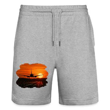 Flugzeuglandung bei Sonnenuntergang - Stanley/Stella Unisex Bio Joggingshorts Trainer  - Grau meliert - Vorne - Nik (191cm) & Marisol (170cm)