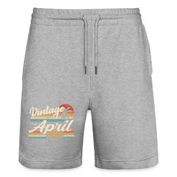 April 1983 Geburtstag Vintage Geschenkidee 1983 - Stanley/Stella Unisex Bio Joggingshorts Trainer  - Grau meliert - Vorne - Nik (191cm) & Marisol (170cm)