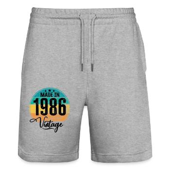 Millésime Fabriqué en 1986 Année de naissance 1986 Anniversaire - Short de jogging bio TRAINER Stanley/Stella unisexe - gris chiné - Devant - Nik (191cm) & Marisol (170cm)
