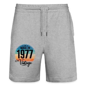 Vintage Fabriqué en 1977 Année de naissance 1977 Anniversaire - Short de jogging bio TRAINER Stanley/Stella unisexe - gris chiné - Devant - Nik (191cm) & Marisol (170cm)