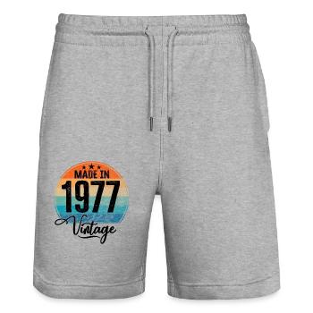Vintage Fabriqué en 1977 Année de naissance 1977 Anniversaire - Short de jogging bio TRAINER Stanley/Stella unisexe - gris chiné - Devant - Nik (191cm) & Marisol (170cm)