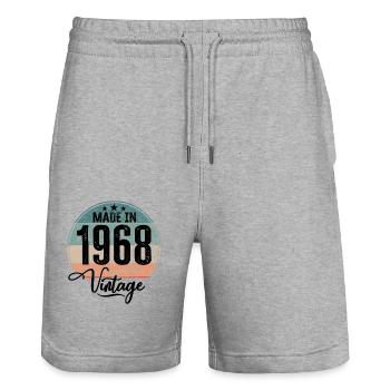 Vintage Fabriqué en 1968 Année de naissance 1968 Anniversaire - Short de jogging bio TRAINER Stanley/Stella unisexe - gris chiné - Devant - Nik (191cm) & Marisol (170cm)
