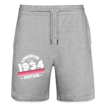 Unique depuis 1934 Edition Anniversaire Millésime 1934 - Short de jogging bio TRAINER Stanley/Stella unisexe - gris chiné - Devant - Nik (191cm) & Marisol (170cm)