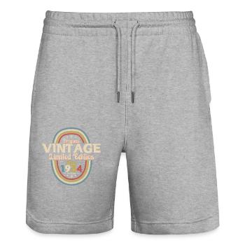 90e anniversaire cadeau mari avril Vintage 1934 - Short de jogging bio TRAINER Stanley/Stella unisexe - gris chiné - Devant - Nik (191cm) & Marisol (170cm)