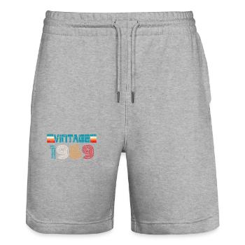 1969 Birthday Vintage - Stanley/Stella Trainer Unisex Organic Jogging Shorts - heather grey - Front - Nik (191cm) & Marisol (170cm)