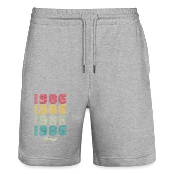 38 Jahre alter Jahrgang 1986 Limitierte Auflage 38. - Stanley/Stella Unisex Bio Joggingshorts Trainer  - Grau meliert - Vorne - Nik (191cm) & Marisol (170cm)