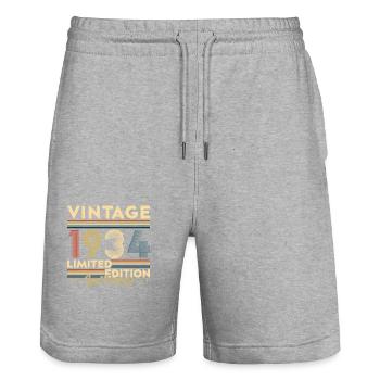 Cadeau d'anniversaire Vinatge 1934 - Short de jogging bio TRAINER Stanley/Stella unisexe - gris chiné - Devant - Nik (191cm) & Marisol (170cm)