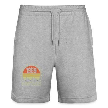 1989 Jahrgang Jahrgang 1989 Geburtstagsgeschenk 1989 - Stanley/Stella Unisex Bio Joggingshorts Trainer  - Grau meliert - Vorne - Nik (191cm) & Marisol (170cm)