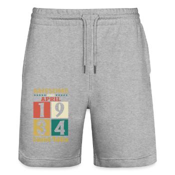 90e anniversaire cadeau mari avril Vintage 1934 - Short de jogging bio TRAINER Stanley/Stella unisexe - gris chiné - Devant - Nik (191cm) & Marisol (170cm)