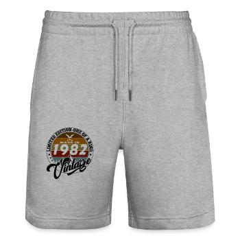 Elegant Vintage: 1982 Retro Gift 1982 2025 - Stanley/Stella Trainer Unisex Organic Jogging Shorts - heather grey - Front - Nik (191cm) & Marisol (170cm)