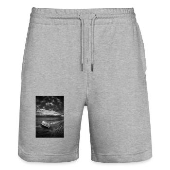 Ein Boot an einem dunklen Ufer - Stanley/Stella Unisex Bio Joggingshorts Trainer  - Grau meliert - Vorne - Nik (191cm) & Marisol (170cm)