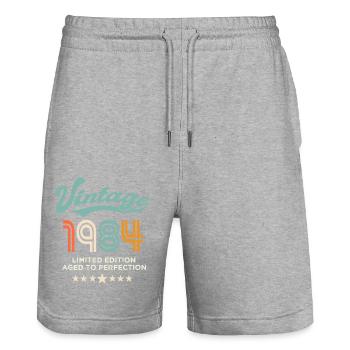 Jahrgang 1984 Geburtstag 1984, 40 Jahre alt - Stanley/Stella Unisex Bio Joggingshorts Trainer  - Grau meliert - Vorne - Nik (191cm) & Marisol (170cm)