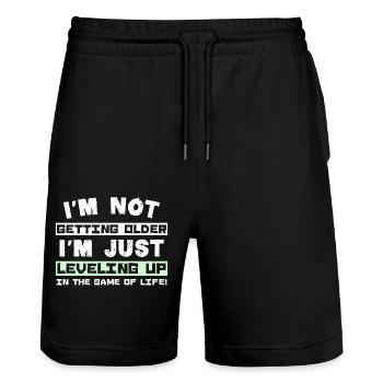 I'm not getting older I'm just leveling up in the - Stanley/Stella Unisex Bio Joggingshorts Trainer  - Schwarz - Vorne - Nik (191cm) & Marisol (170cm)