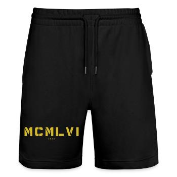 With Roman numerals MCMLVI - Made in 1956 - Stanley/Stella Trainer Unisex Organic Jogging Shorts - black - Front - Nik (191cm) & Marisol (170cm)