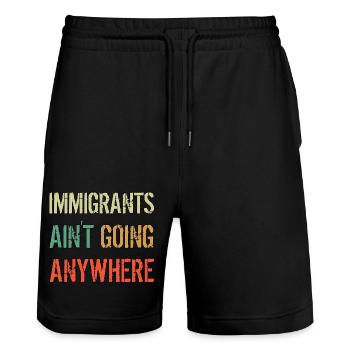 LES IMMIGRANTS NE VONT NULLE PART Droits des immigrants - Short de jogging bio TRAINER Stanley/Stella unisexe - noir - Devant - Nik (191cm) & Marisol (170cm)