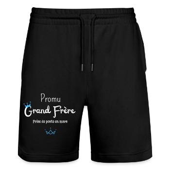Promu grand frère en mars - annonce grossesse - Short de jogging bio TRAINER Stanley/Stella unisexe - noir - Devant - Nik (191cm) & Marisol (170cm)