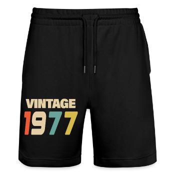 1977 Vintage Retro Classic 1977 - Stanley/Stella Trainer Unisex Organic Jogging Shorts - black - Front - Nik (191cm) & Marisol (170cm)