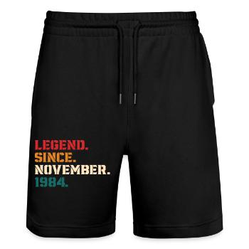 Legende seit November 1984 - Stanley/Stella Unisex Bio Joggingshorts Trainer  - Schwarz - Vorne - Nik (191cm) & Marisol (170cm)