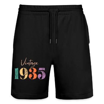 Jahrgang 1935 Blumen - Stanley/Stella Unisex Bio Joggingshorts Trainer  - Schwarz - Vorne - Nik (191cm) & Marisol (170cm)