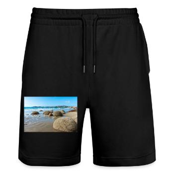 roches sphériques Moeraki Boulders Nouvelle-Zélande Otago - Short de jogging bio TRAINER Stanley/Stella unisexe - noir - Devant - Nik (191cm) & Marisol (170cm)