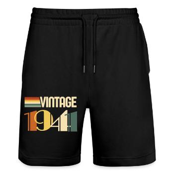Jahrgang 1943 - 1943 Geburtstagsgeschenk - Stanley/Stella Unisex Bio Joggingshorts Trainer  - Schwarz - Vorne - Nik (191cm) & Marisol (170cm)