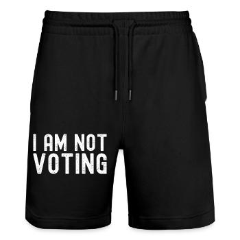 Je ne vote pas - Nous n’avons pas besoin des mêmes candidats - Short de jogging bio TRAINER Stanley/Stella unisexe - noir - Devant - Nik (191cm) & Marisol (170cm)