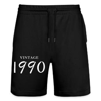 Jahrgang 1990er Jahre - Geschenkidee zum Geburtstag - Stanley/Stella Unisex Bio Joggingshorts Trainer  - Schwarz - Vorne - Nik (191cm) & Marisol (170cm)