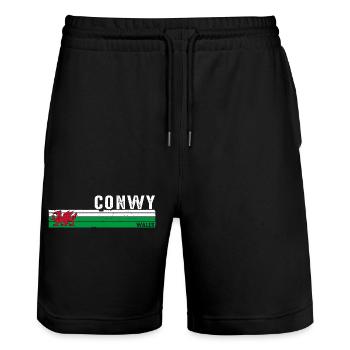 Explorez le design rétro de Conwy Wales pour la culture galloise - Short de jogging bio TRAINER Stanley/Stella unisexe - noir - Devant - Nik (191cm) & Marisol (170cm)