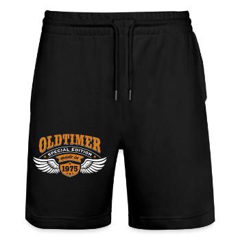 Oldtimer Made in 1975 - Geburtstag - Geschenk - Stanley/Stella Unisex Bio Joggingshorts Trainer  - Schwarz - Vorne - Nik (191cm) & Marisol (170cm)