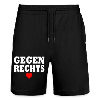 Gegen rechts - Stanley/Stella Unisex Bio Joggingshorts Trainer  - Schwarz - Vorne - Nik (191cm) & Marisol (170cm)