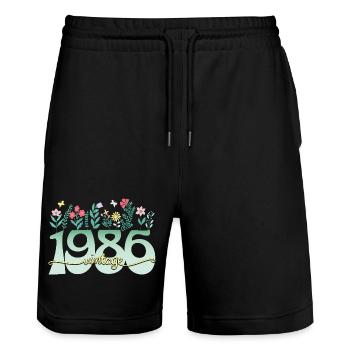 1986 Fleurs 40 Ans Anniversaire Femme - Short de jogging bio TRAINER Stanley/Stella unisexe - noir - Devant - Nik (191cm) & Marisol (170cm)